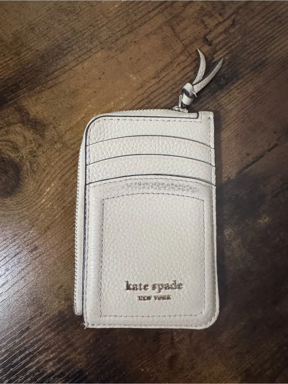 kate spade Cream Pebbled Leather Zip Card Case with Gold Logo